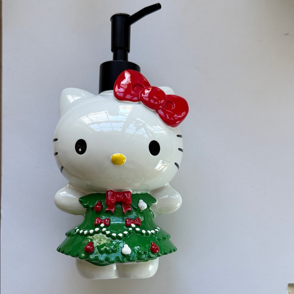 “Hello Kitty” Christmas Tree 🎄Dress Lotion Dispenser with Red Hair Bow